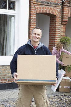 Packing boxes and moving supplies prepared for a Wimbledon home move