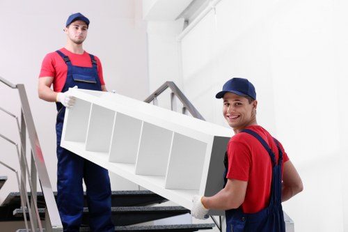 Removal team preparing equipment before a safe house move