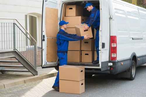 Loading furniture into a van for a Wimbledon relocation