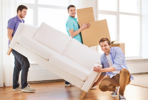 Professional Wimbledon removal team loading furniture safely