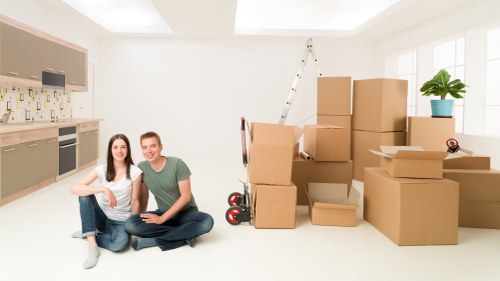 Packed boxes ready for a Wimbledon flat removal with clear labels and careful organisation