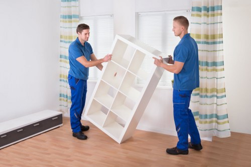 Moving truck helping with a residential relocation in Wimbledon
