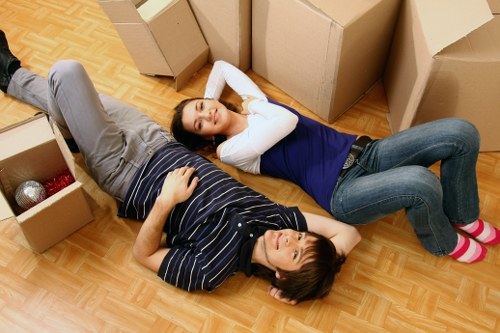 Boxes and furniture being loaded for a local student move